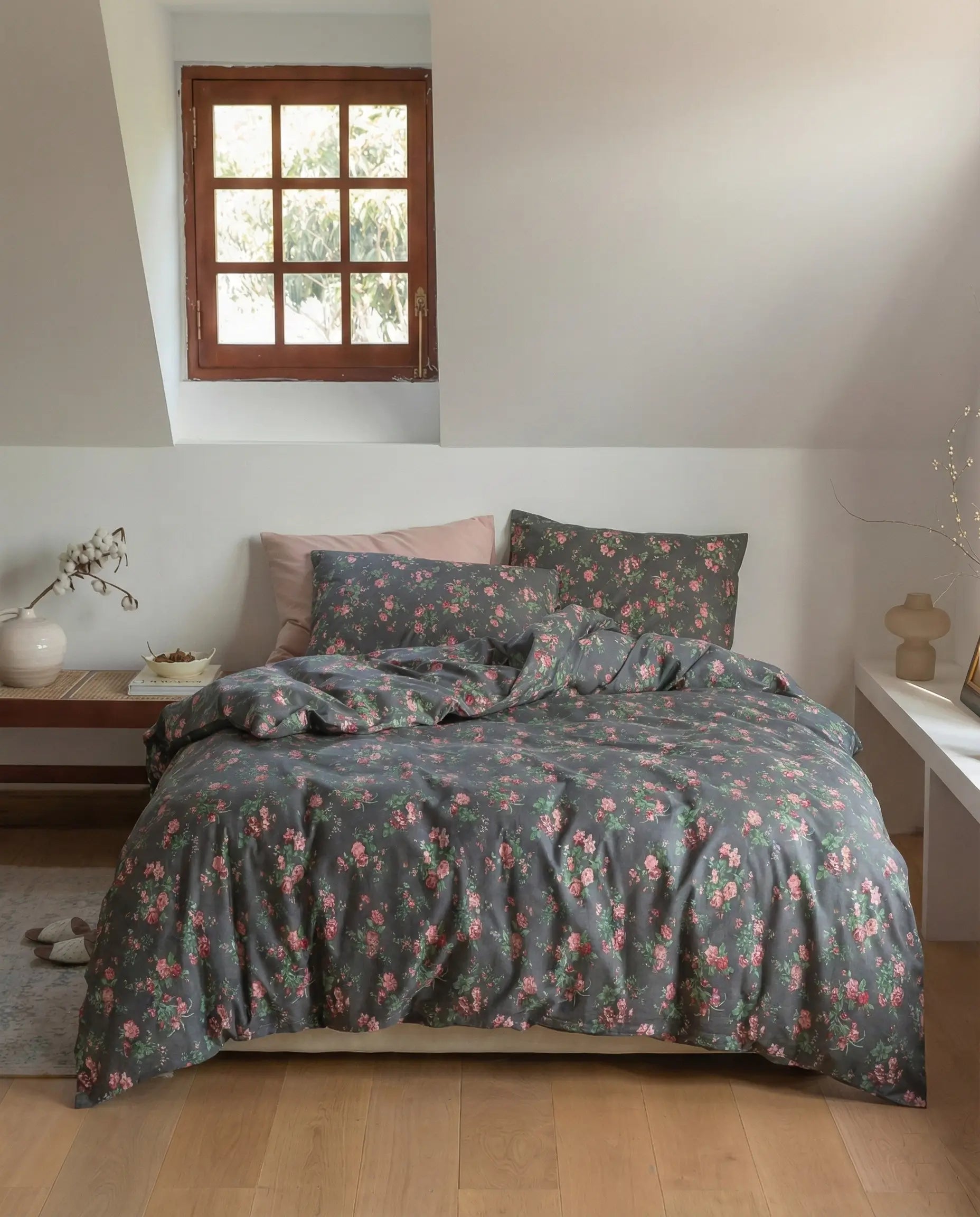 Black floral duvet cover set styled in cozy bedroom with wooden floor and neutral decor, elegant cotton bedding