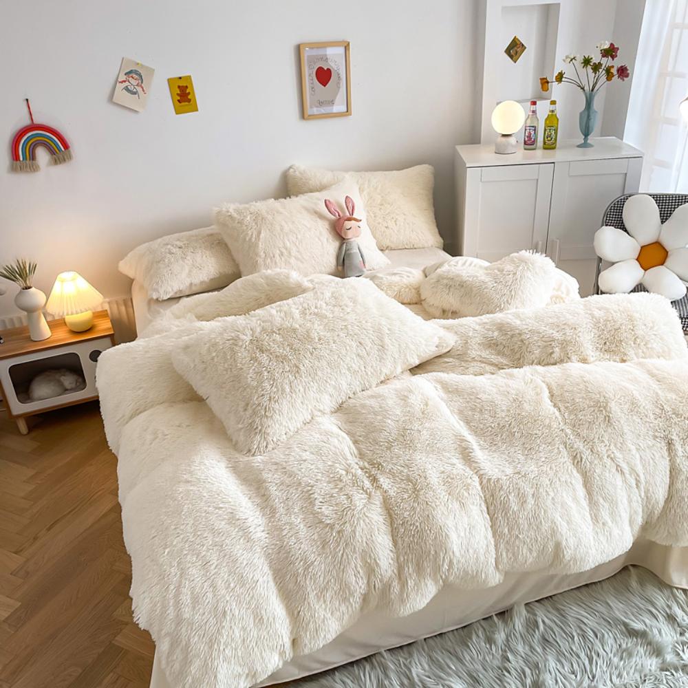 Another side angle of the VibeCore Cloud 9 Fleece Bedding Set in the color white, showcasing its ultra-soft fleece fabric for ultimate comfort and cozy warmth. Ideal for creating a fresh, inviting atmosphere in your bedroom or dorm, this bedding set adds both luxury and style.