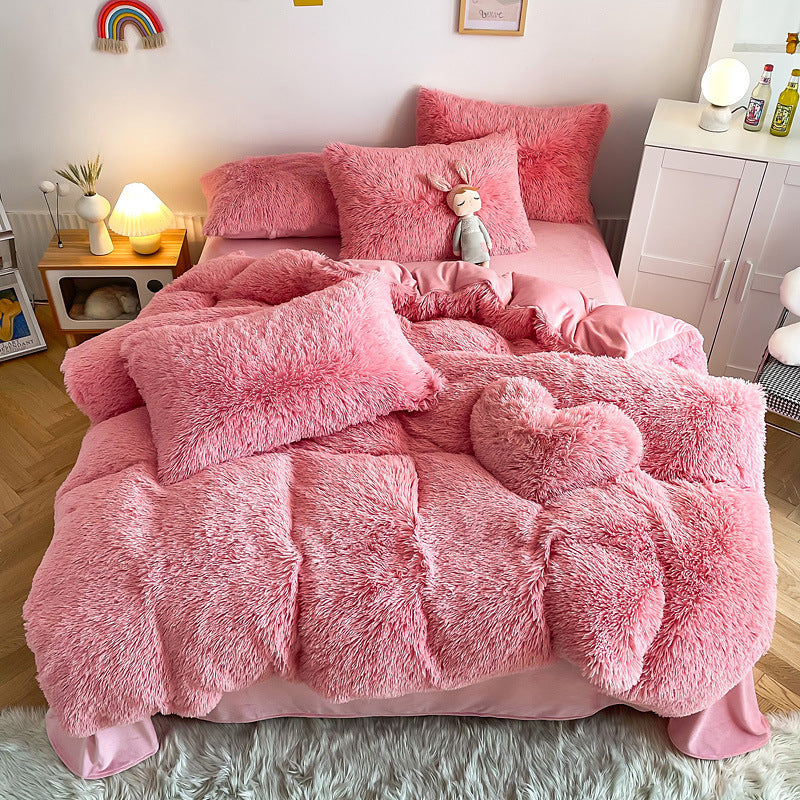 Aerial view of the VibeCore Cloud 9 Bedding Set in the color Pink, made from ultra-soft fleece for ultimate comfort. Perfect for adding warmth, luxury, and cozy style to any bedroom or dorm. Ideal for lounging, relaxing, and enhancing your space with plush, durable bedding that’s machine washable and tumble-dry friendly.