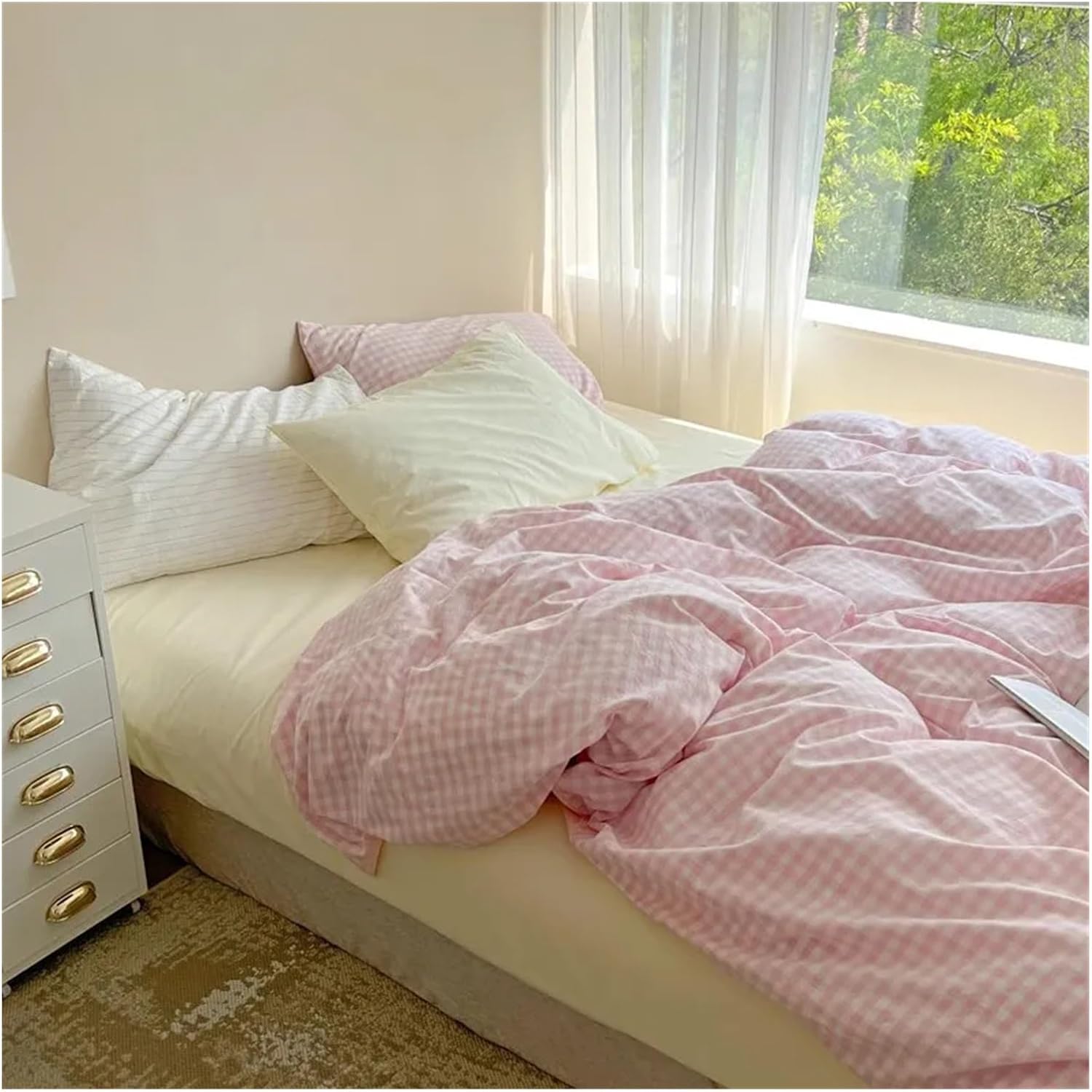 Side view of the VibeCore Pastel Pink Plaid Bedding Set, showcasing the soft fabric, pastel pink plaid design, and neatly arranged bedding details.