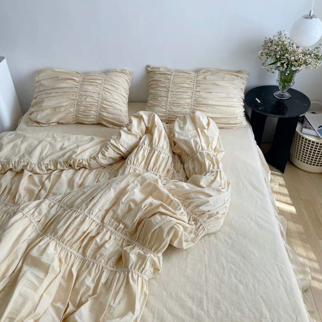 Aerial view of the VibeCore Royal Pleated Bedding Set, featuring a slept-in look with soft, luxurious cotton and beautiful pleated details that enhance the cozy, chic aesthetic.