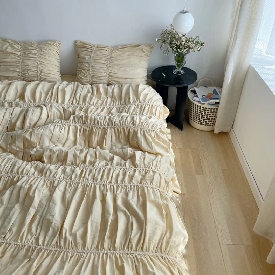 Top right view of the VibeCore Royal Pleated Bedding Set, highlighting the intricate pleated details and soft cotton fabric that provide a timeless, elegant touch to your bedroom or dorm decor.