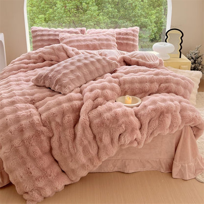 Aerial view of the VibeCore Snuggle Supreme Bedding Set in the color Rose, featuring a plush tufted design made from ultra-soft milk fibre. The bedding set includes a duvet cover, flat sheet, and pillowcases, offering both luxury and comfort with a breathable, hypoallergenic fabric.