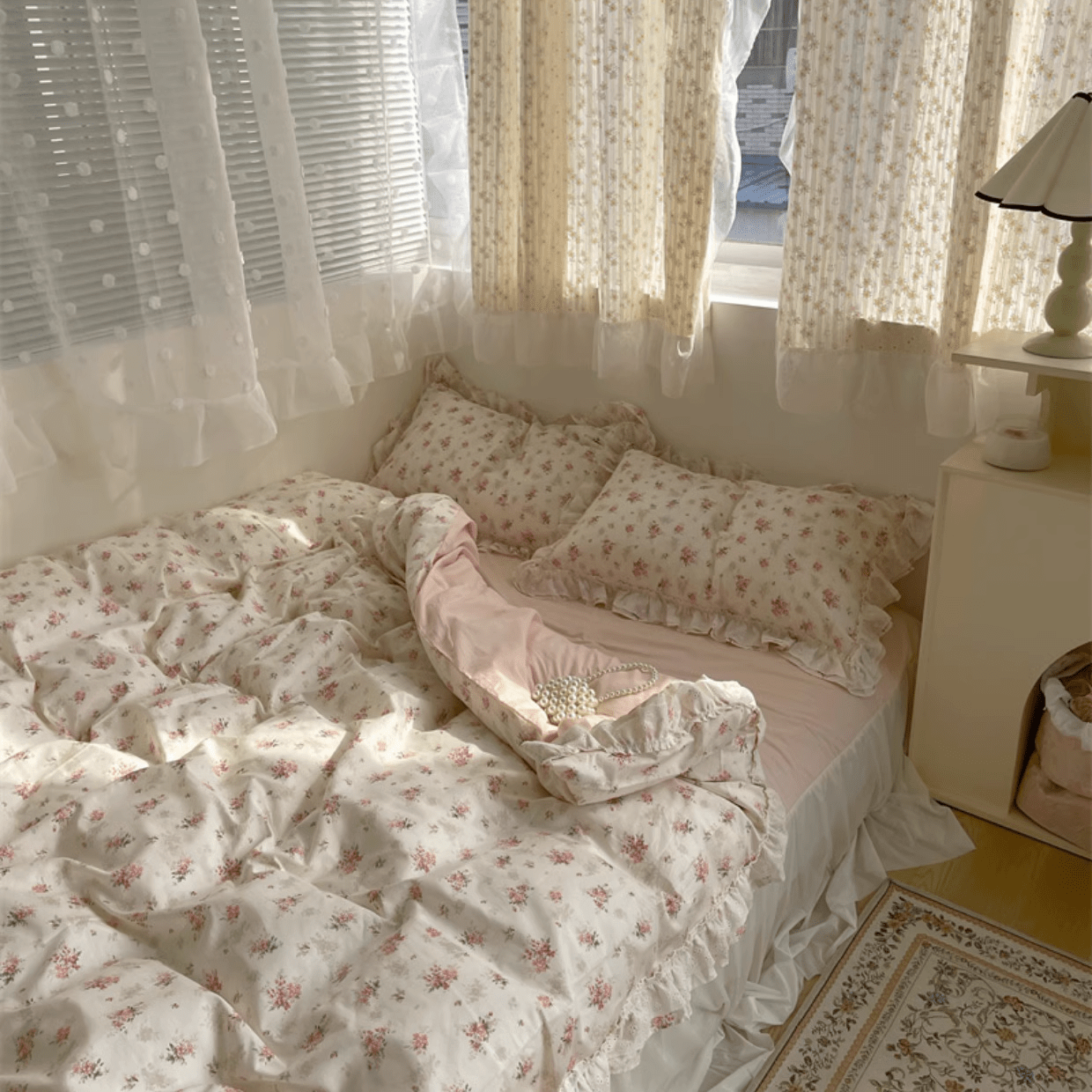 VibeCore Coquette Embroidered Pink Floral Duvet Cover Set aerial angled right view, highlighting elegant pink floral embroidery and breathable cotton fabric design.