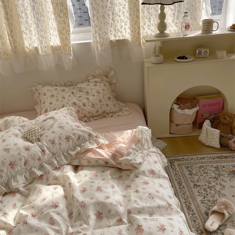 VibeCore Coquette Embroidered Pink Floral Duvet Cover Set aerial close-up of the right corner, showcasing delicate pink floral embroidery on soft, breathable cotton.