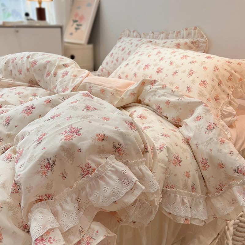 Close-up of the Embroidered Pink Floral Bedding Set showcasing intricate floral embroidery on soft 100% cotton fabric, adding a feminine, cozy touch to any bedroom or dorm.