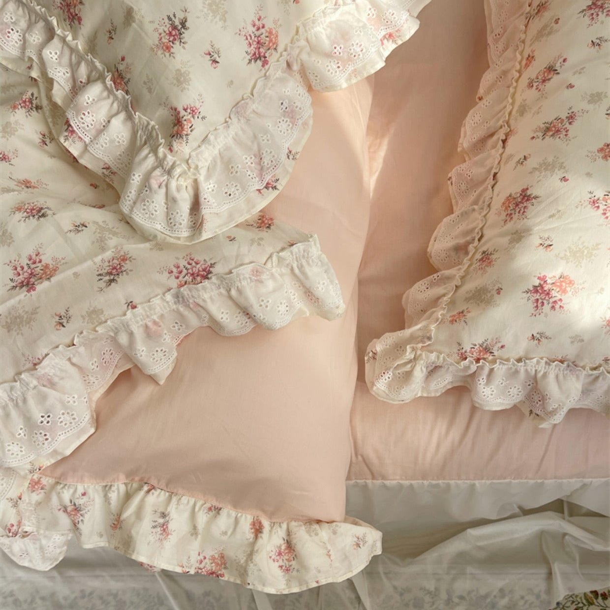 Close-up details of the Embroidered Pink Floral Bedding Set, showcasing intricate floral embroidery on soft 100% cotton fabric, perfect for a feminine, cozy bedroom aesthetic. Features delicate pink flowers and vintage-inspired design, ideal for adding a stylish and comfortable touch to your bedroom decor.