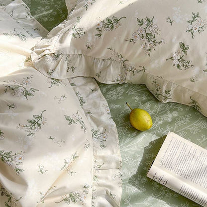 Close-up view of the intricate floral pattern on the VibeCore Cottagecore Green Garden Double-Sided Duvet Cover Set, highlighting its soft, nature-inspired design with delicate green tones and charming garden motifs, perfect for adding a touch of rustic elegance to your bedroom or dorm.