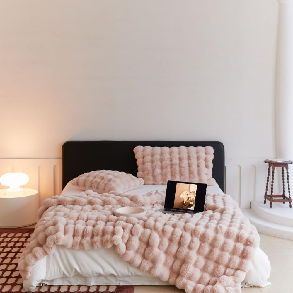 VibeCore Marshmallow Ultra Plush Blanket Blossom On Bed, demonstrating its aesthetic appeal.