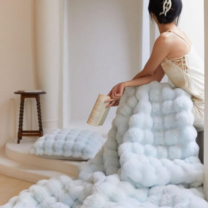 VibeCore Marshmallow Ultra Plush Blanket Pastel Blue With Blanket On Woman's Lap, perfect for relaxing.